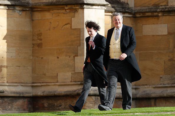 Stephen Fry falls six feet off stage, taken to hospital for