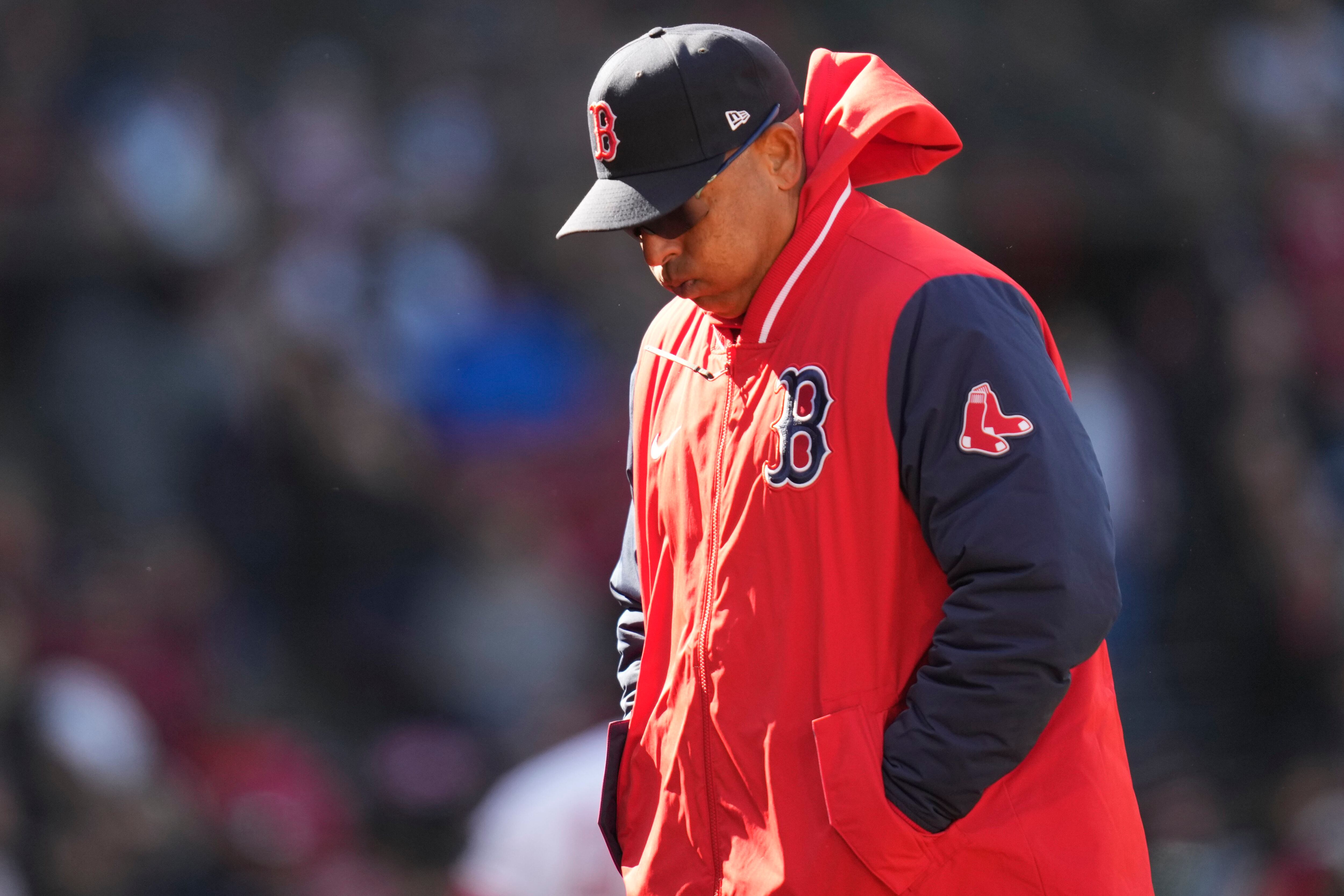 Masataka Yoshida of the Boston Red Sox walks back to the dugout